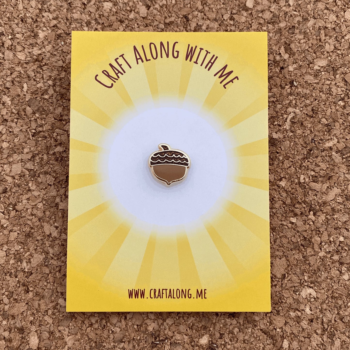 glittery acorn enamel pin