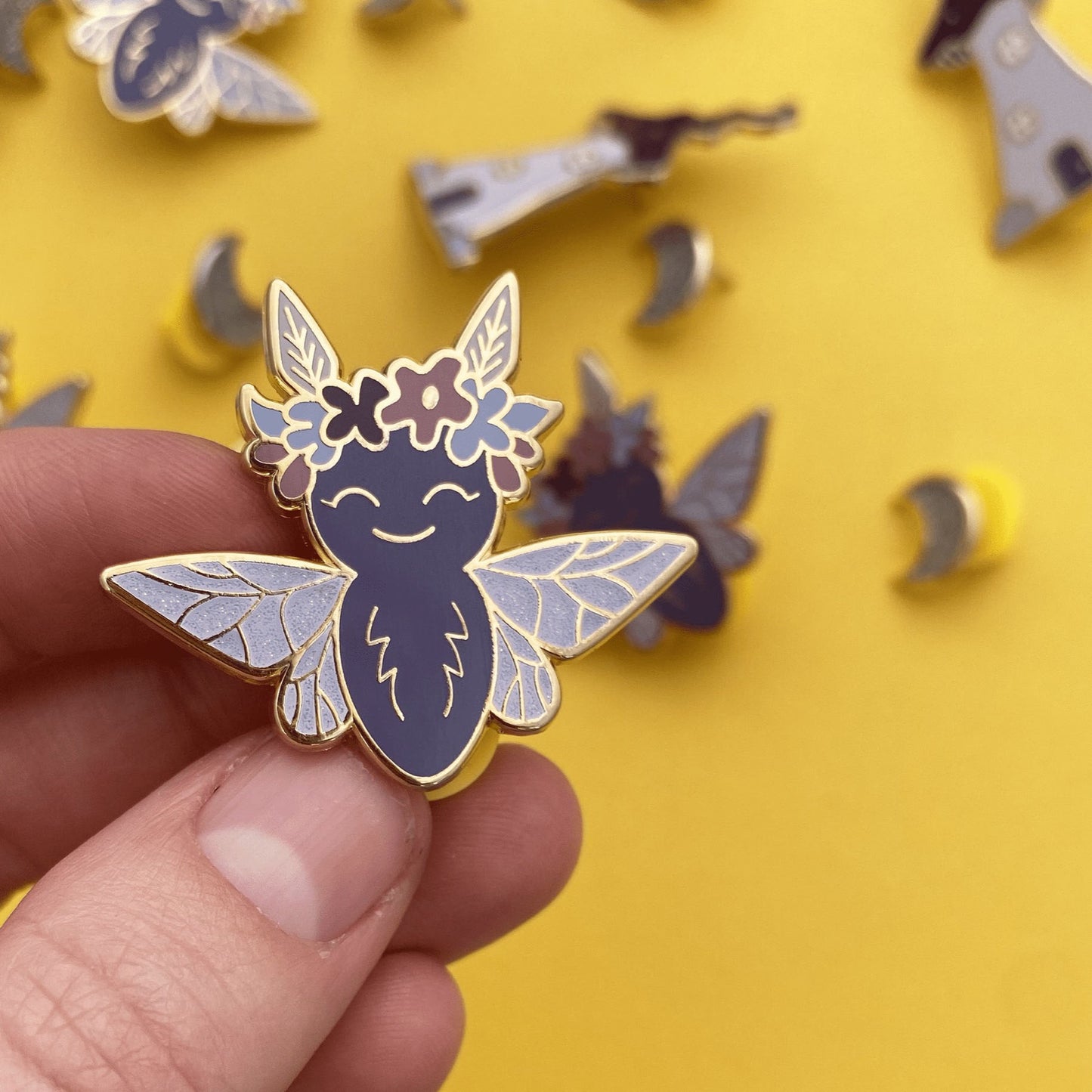 Winter moth fairy enamel pin