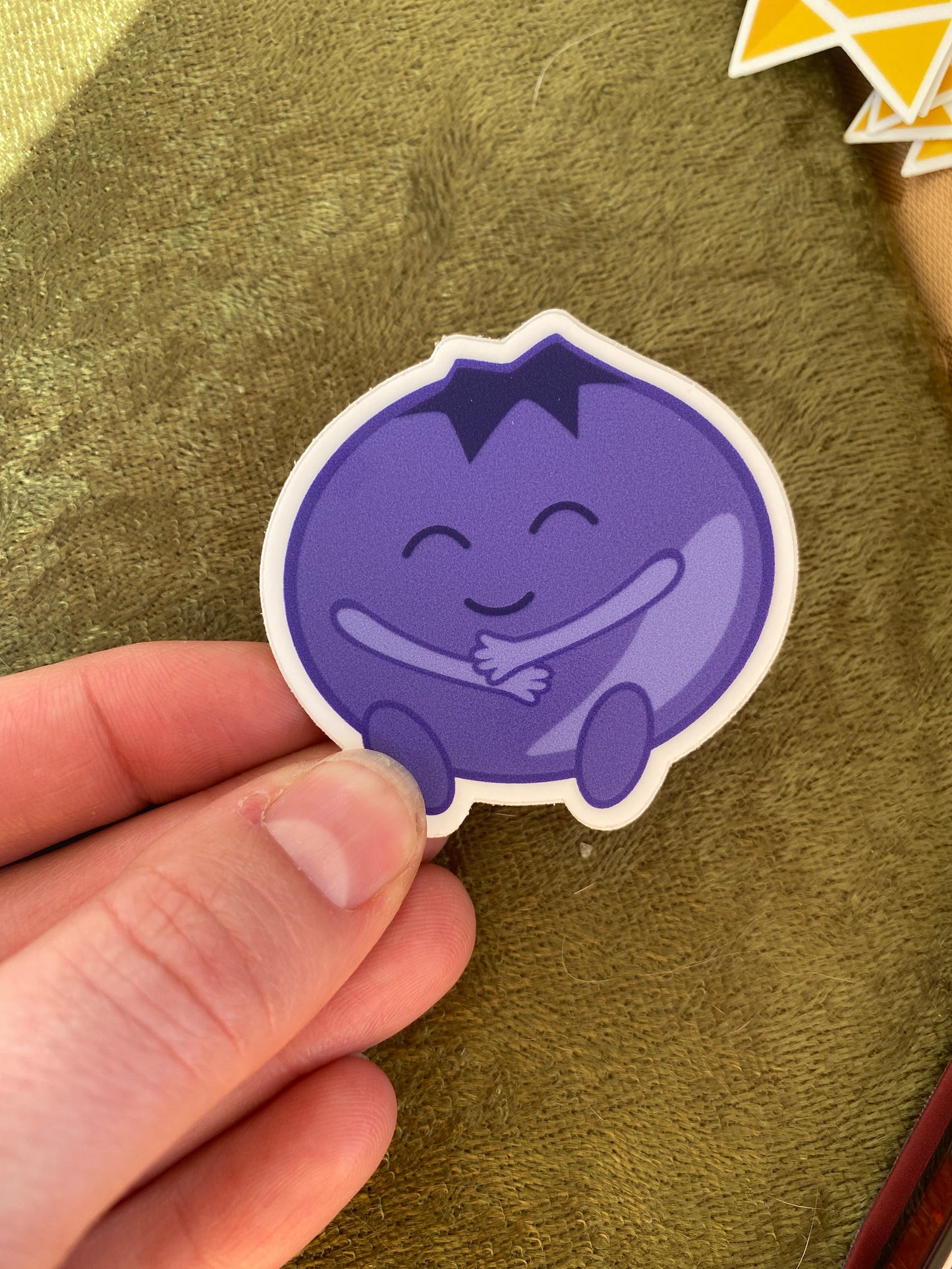 Happy hugging blueberry sticker