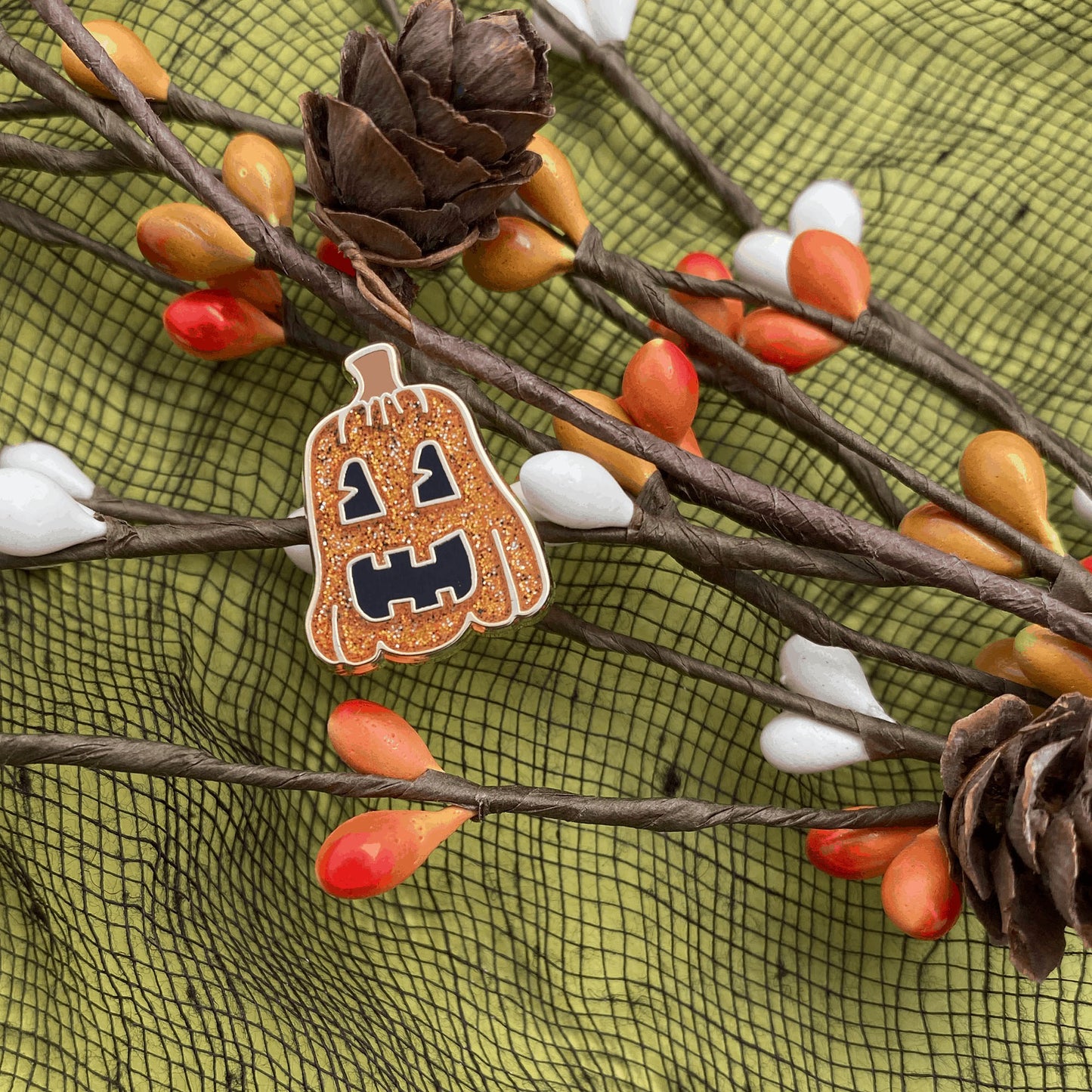 Tall glitter jack-o-lantern enamel pin