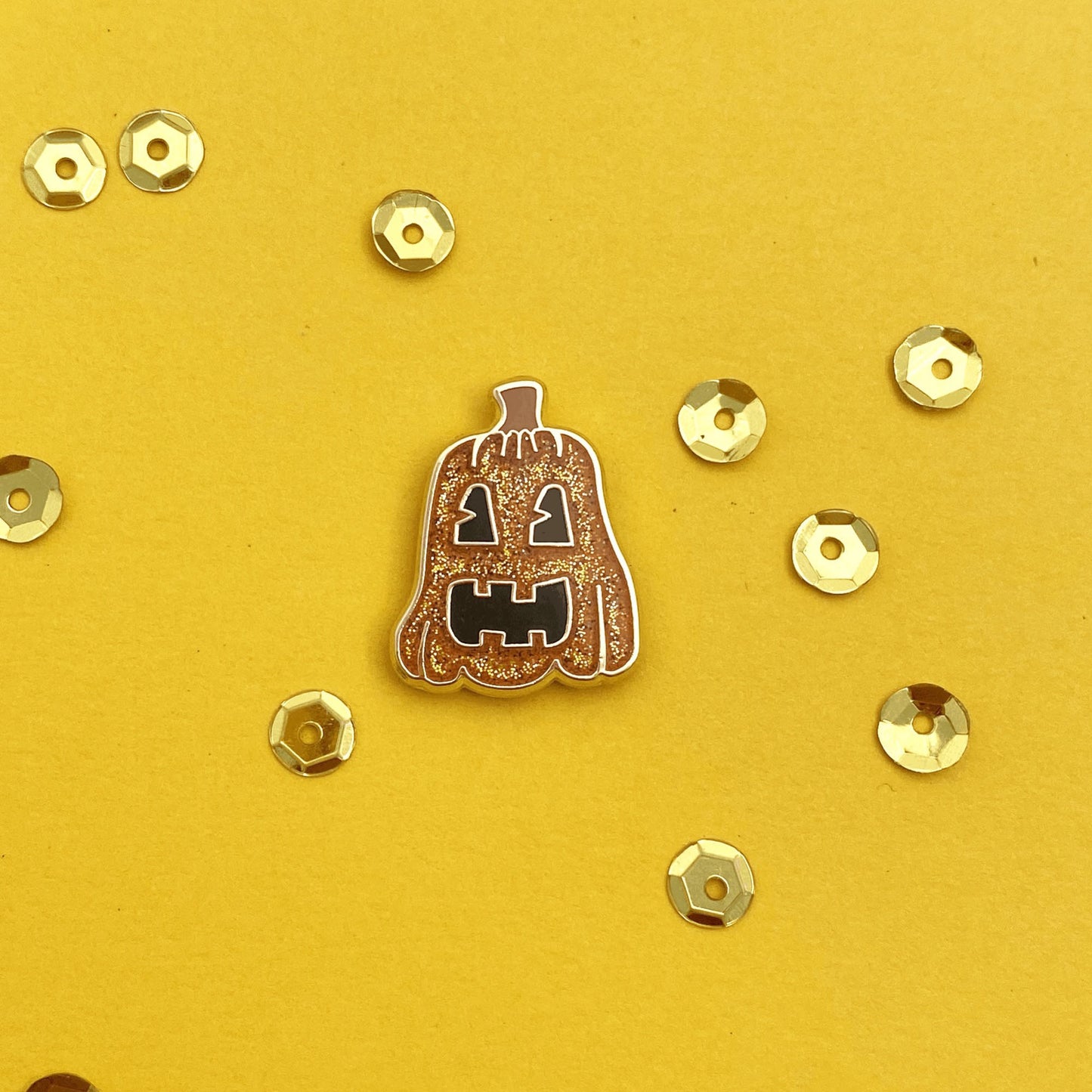 Tall glitter jack-o-lantern enamel pin